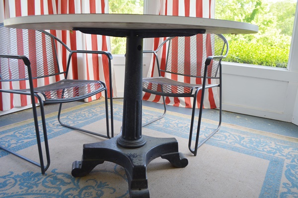 Laminate and Metal Round Table and Four Metal Chairs