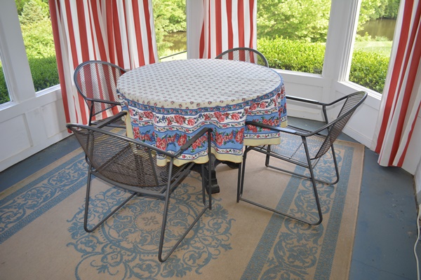 Laminate and Metal Round Table and Four Metal Chairs