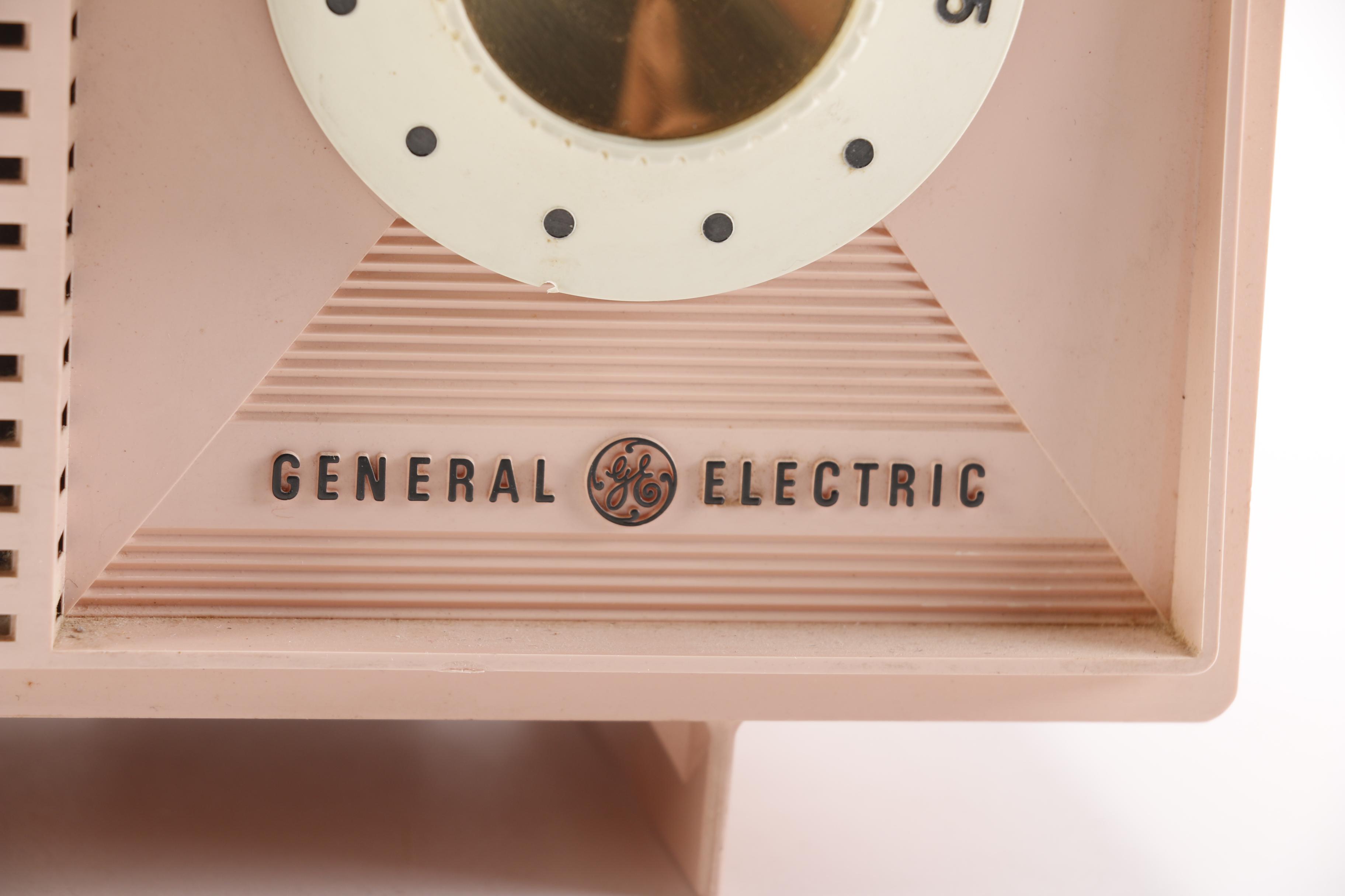 Vintage Pink Plastic GE Radio and Contemporary Alarm Clock