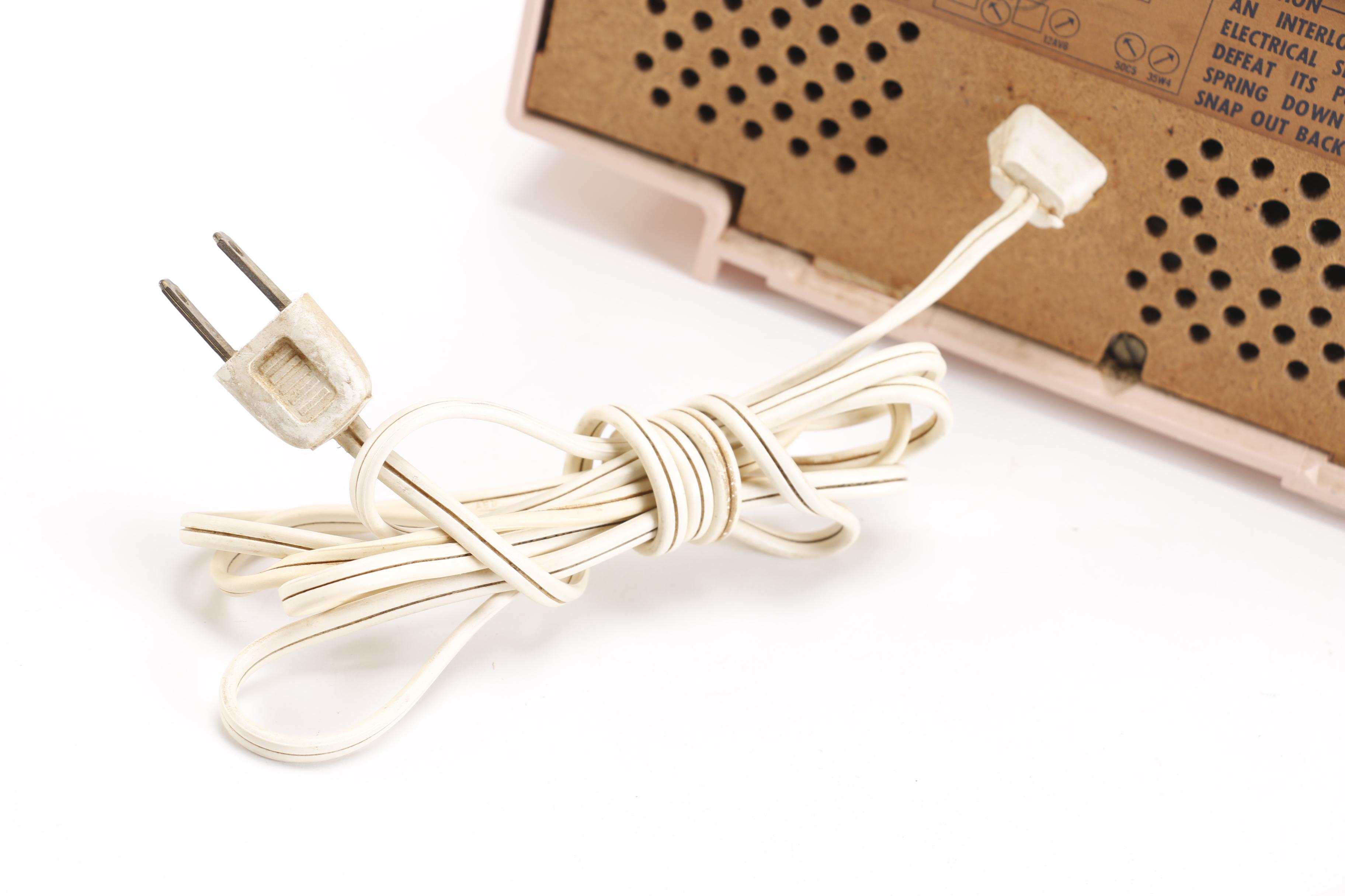 Vintage Pink Plastic GE Radio and Contemporary Alarm Clock