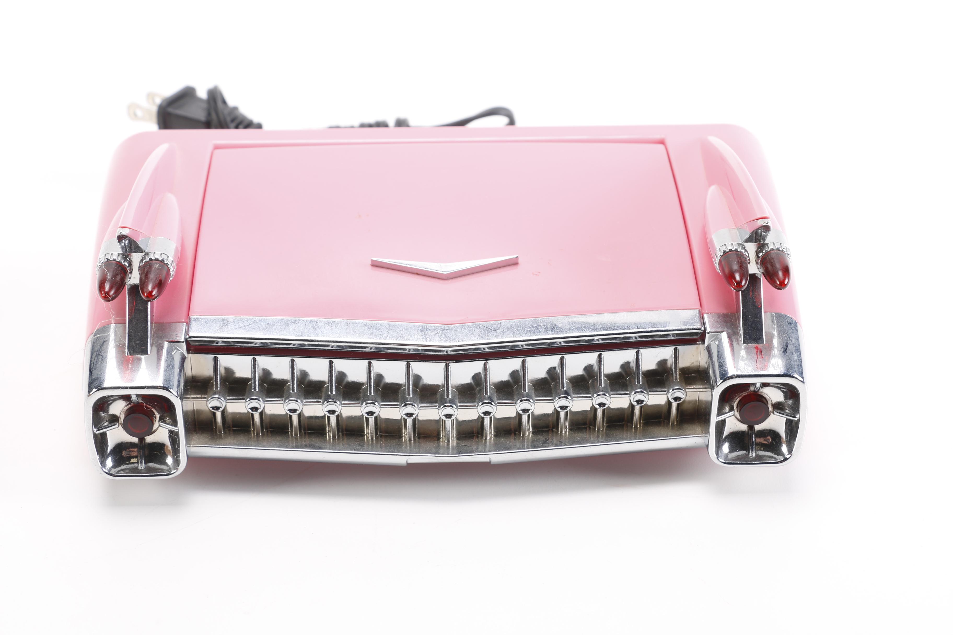 Vintage Pink Plastic GE Radio and Contemporary Alarm Clock