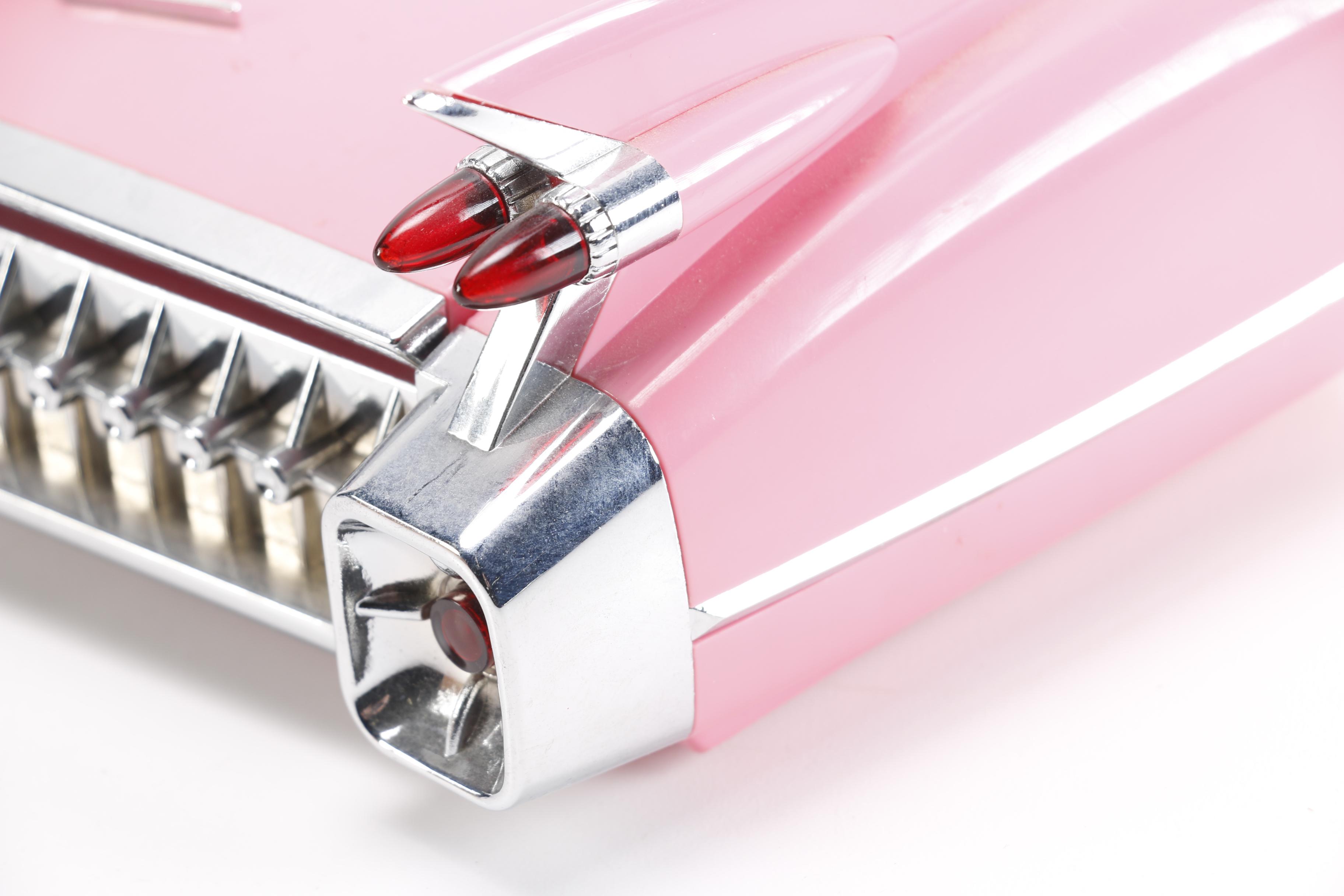 Vintage Pink Plastic GE Radio and Contemporary Alarm Clock