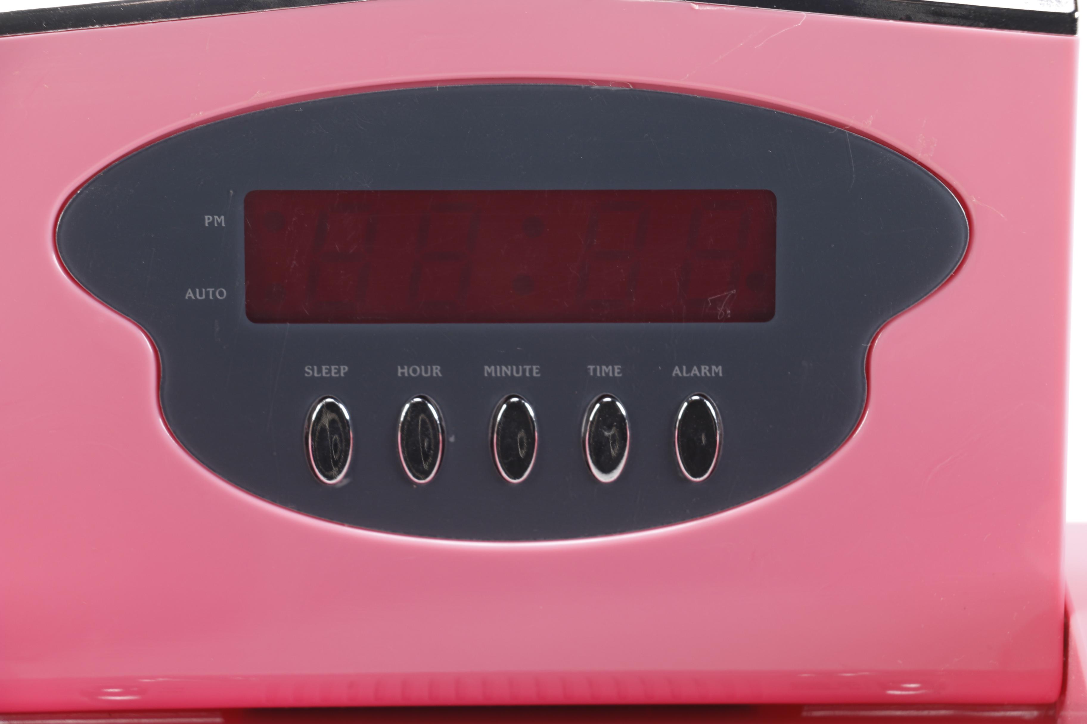 Vintage Pink Plastic GE Radio and Contemporary Alarm Clock