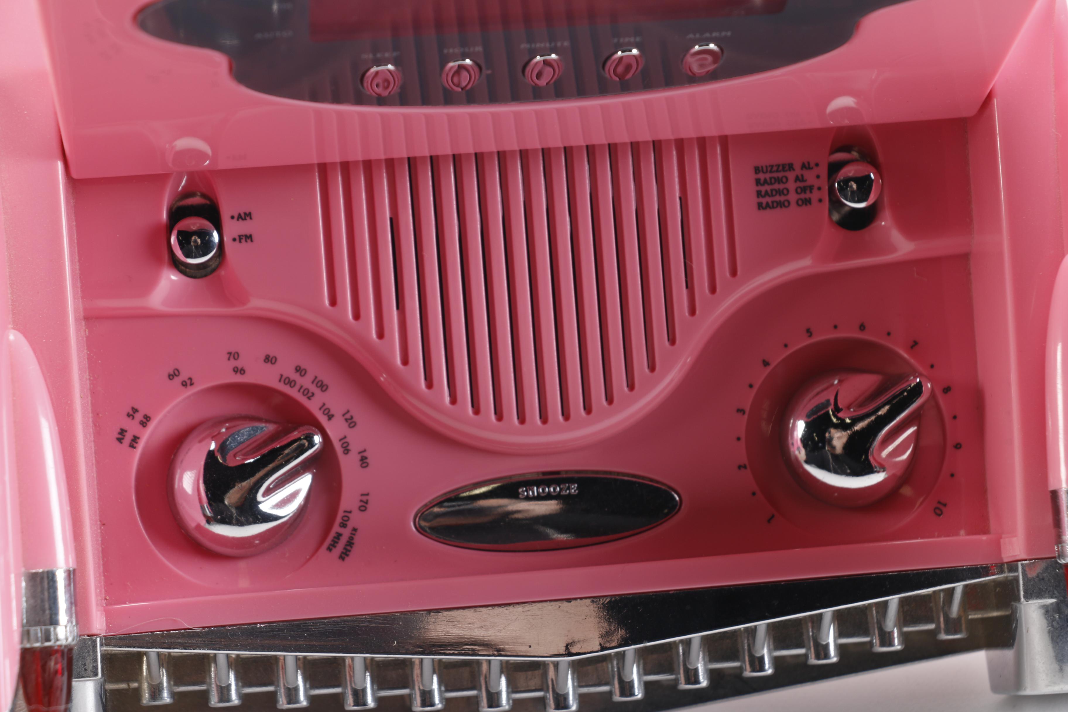 Vintage Pink Plastic GE Radio and Contemporary Alarm Clock