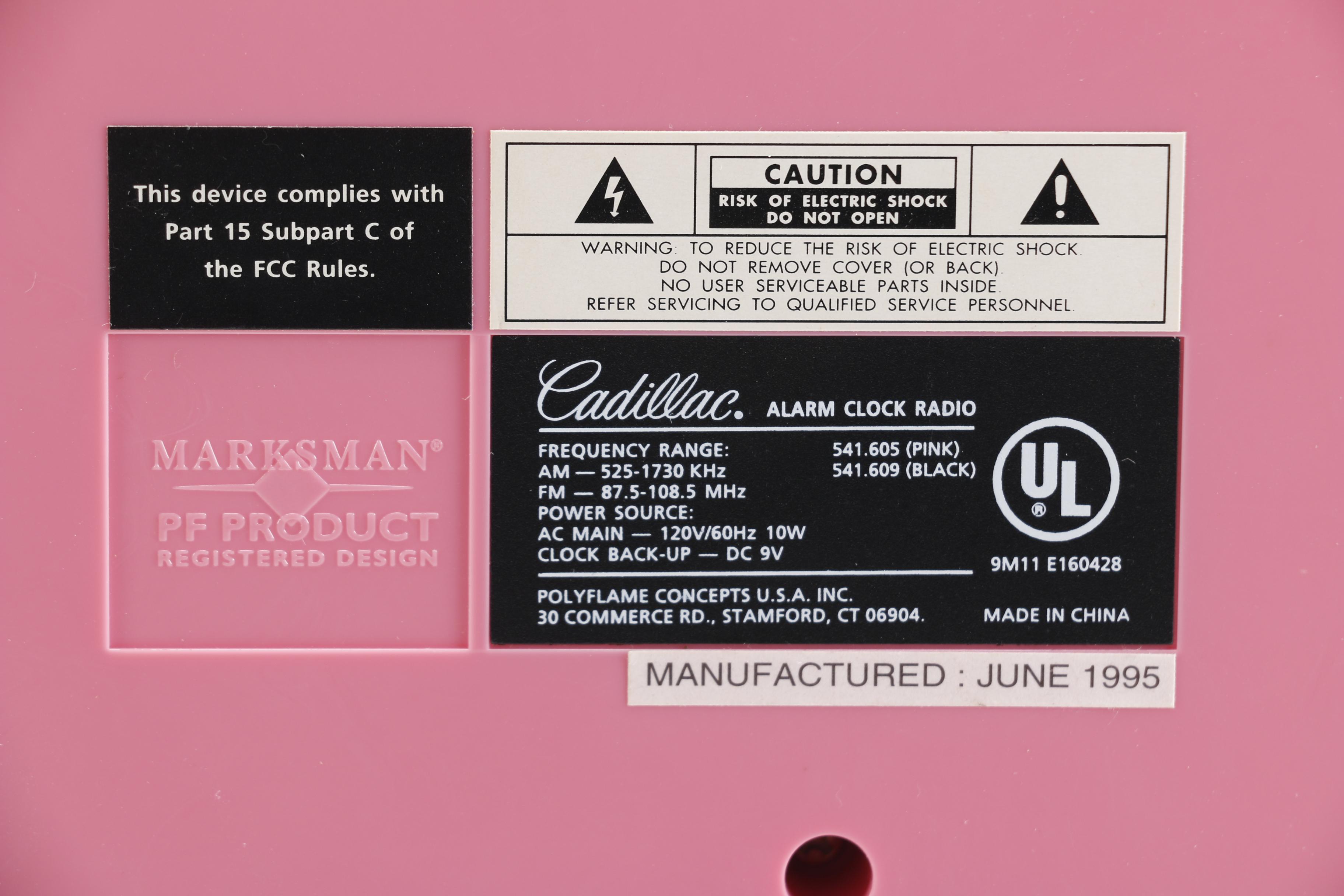 Vintage Pink Plastic GE Radio and Contemporary Alarm Clock