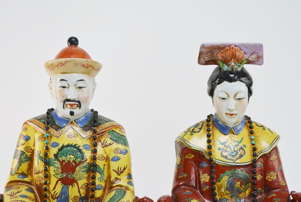 Pair of Chinese Emperor and Empress Porcelain Statues
