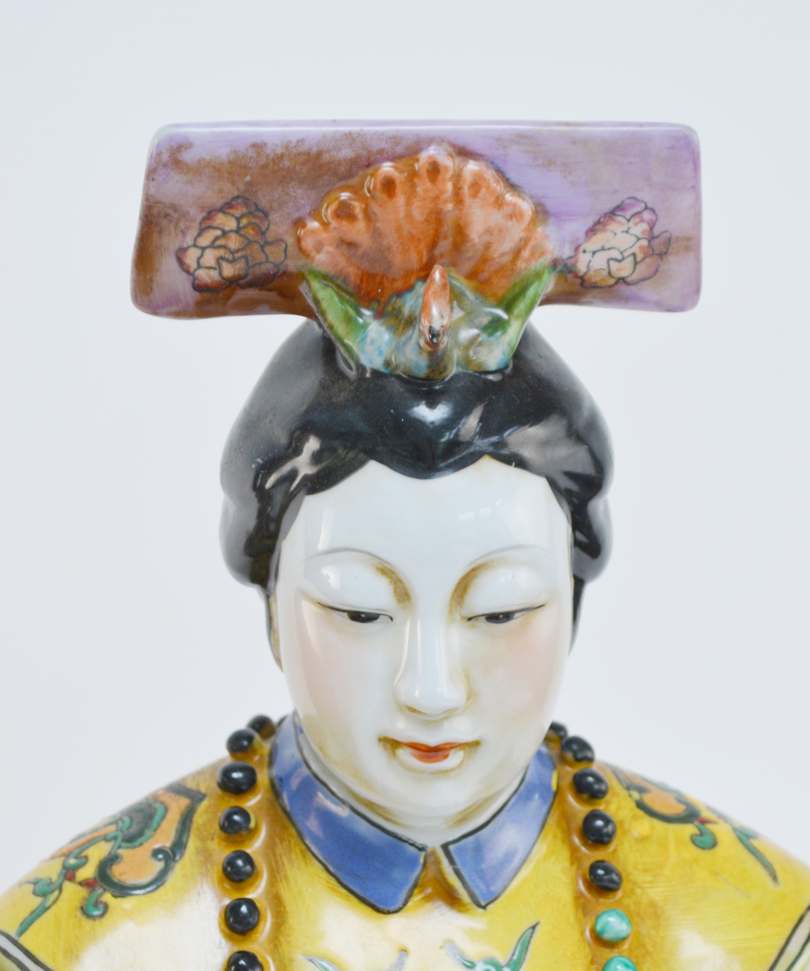 Pair of Chinese Emperor and Empress Porcelain Statues