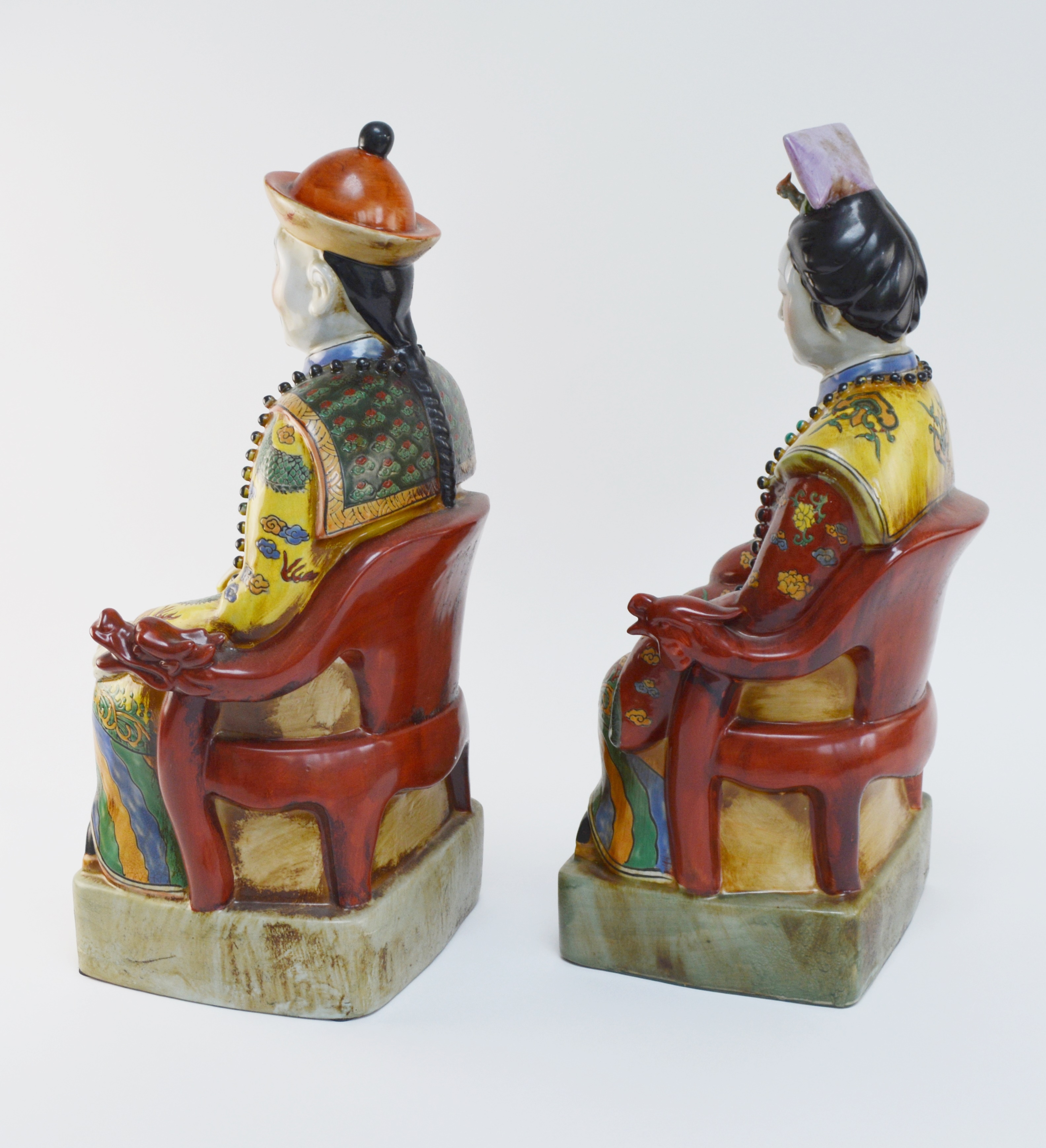 Pair of Chinese Emperor and Empress Porcelain Statues