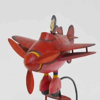 Red Metal Balanced Airplane