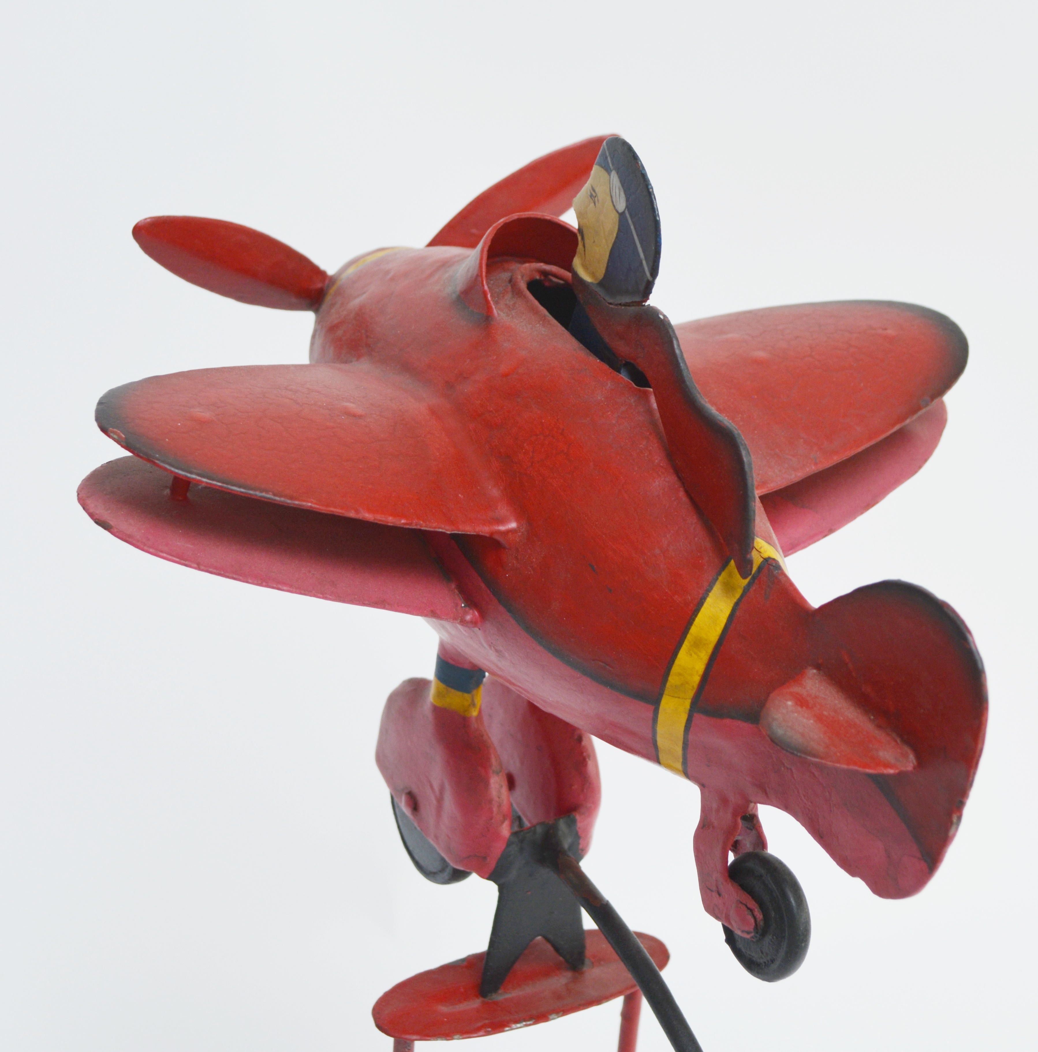 Red Metal Balanced Airplane