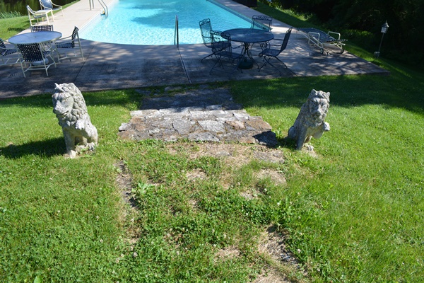 Two Concrete Lion Yard Statues