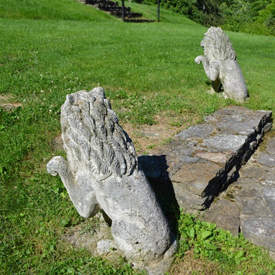 Two Concrete Lion Yard Statues