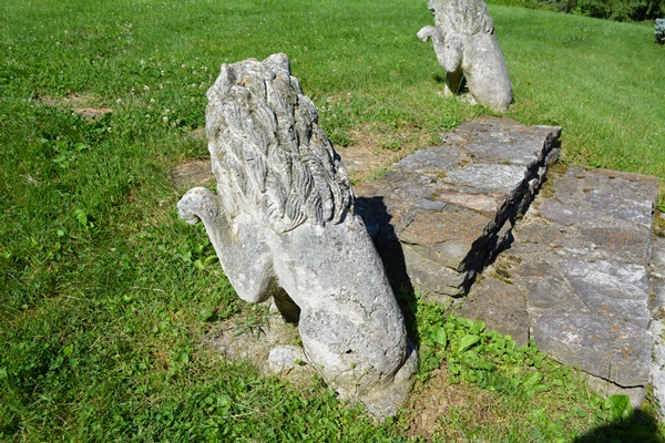 Two Concrete Lion Yard Statues