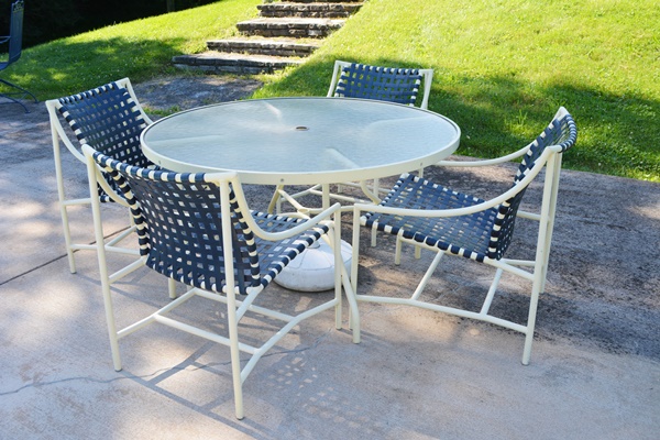 Cream Aluminum Patio Table and Four Chairs