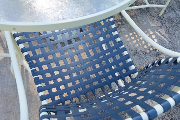 Cream Aluminum Patio Table and Four Chairs
