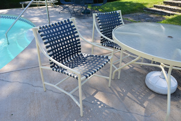 Cream Aluminum Patio Table and Four Chairs