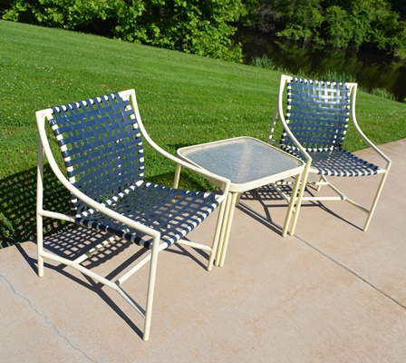 Four Cream Aluminum Patio Chairs and Two Side Tables