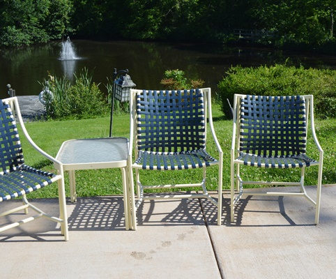 Four Cream Aluminum Patio Chairs and Two Side Tables