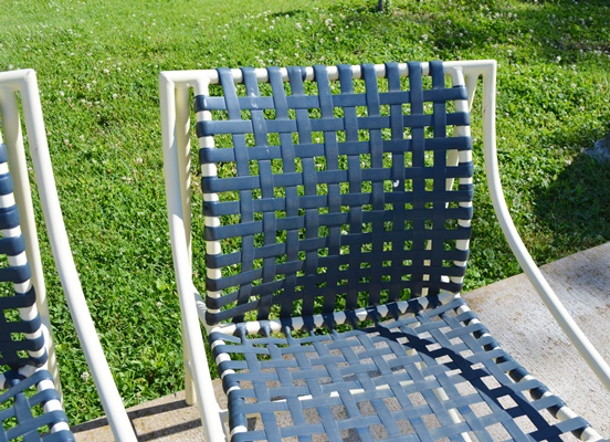 Four Cream Aluminum Patio Chairs and Two Side Tables