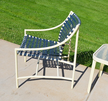 Four Cream Aluminum Patio Chairs and Two Side Tables