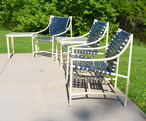 Four Cream Aluminum Patio Chairs and Two Side Tables