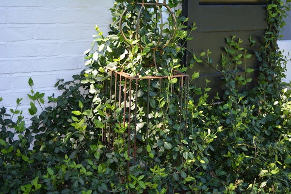 Two Tall Metal Garden Topiary Forms