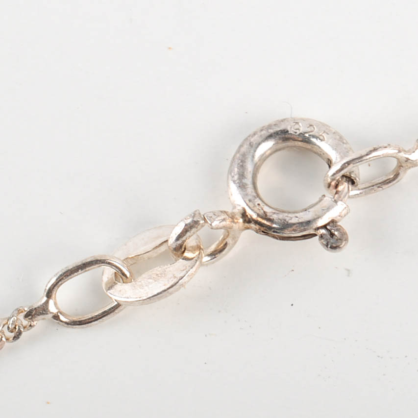 Two Sterling Silver and Cubic Zirconia Necklaces, One With Matching Earrings