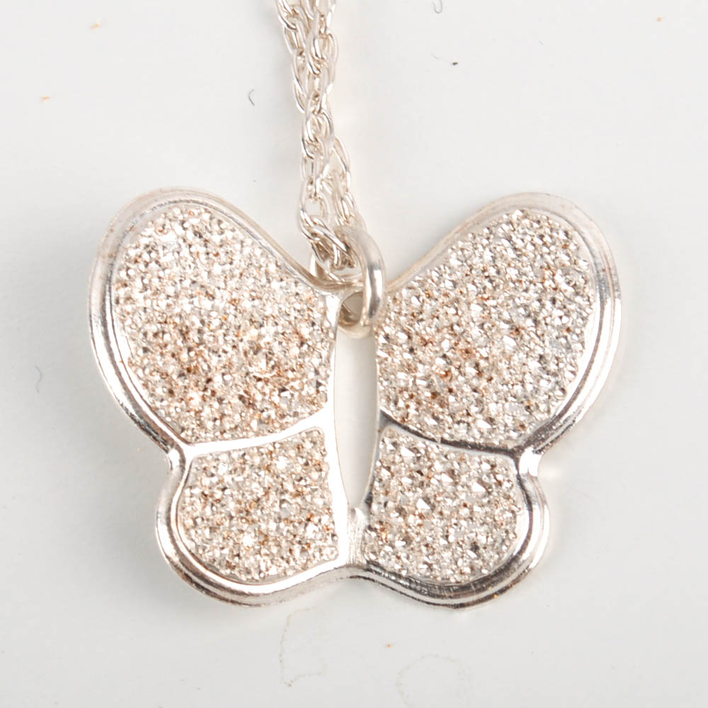 Two Sterling Silver and Cubic Zirconia Necklaces, One With Matching Earrings