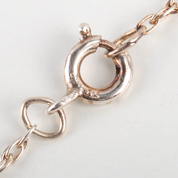 Two Sterling Silver and Cubic Zirconia Necklaces, One With Matching Earrings