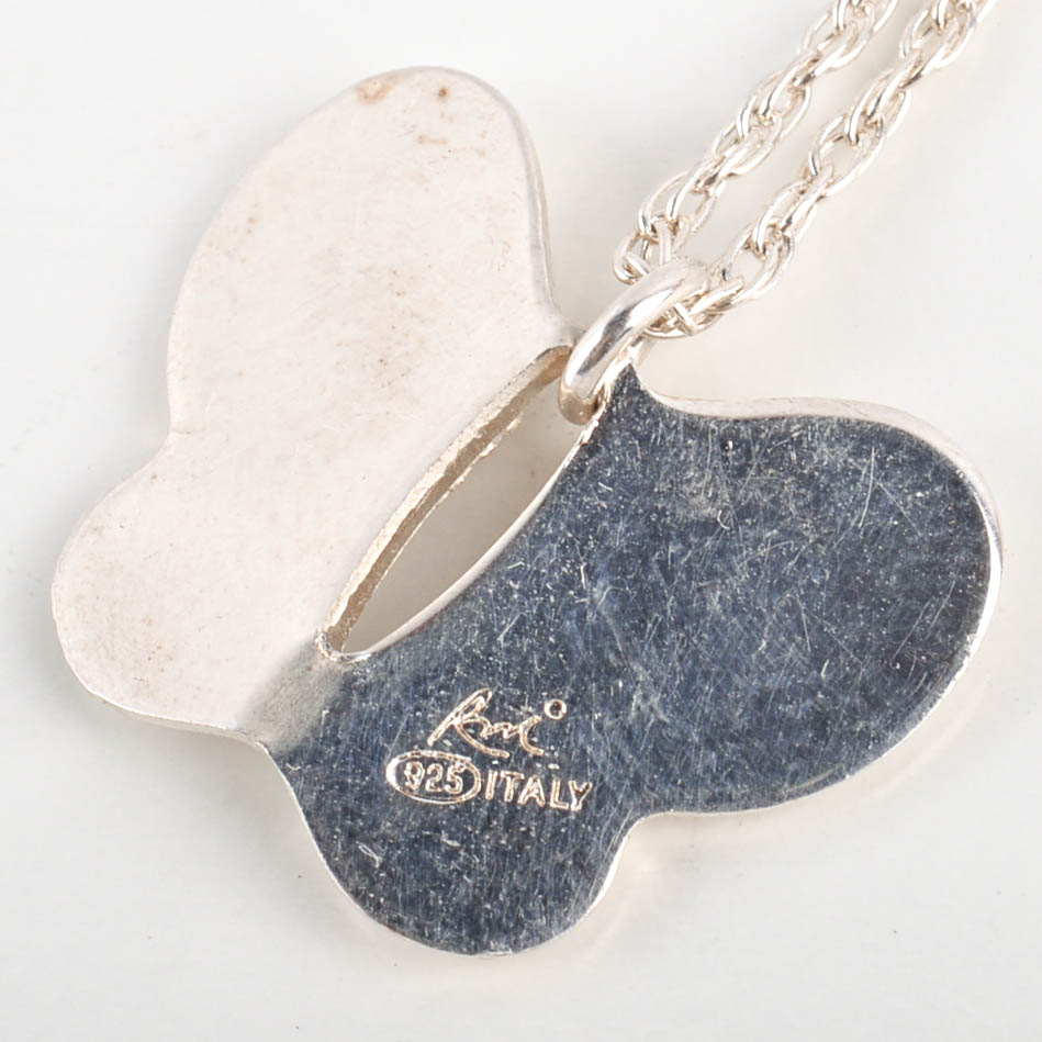 Two Sterling Silver and Cubic Zirconia Necklaces, One With Matching Earrings