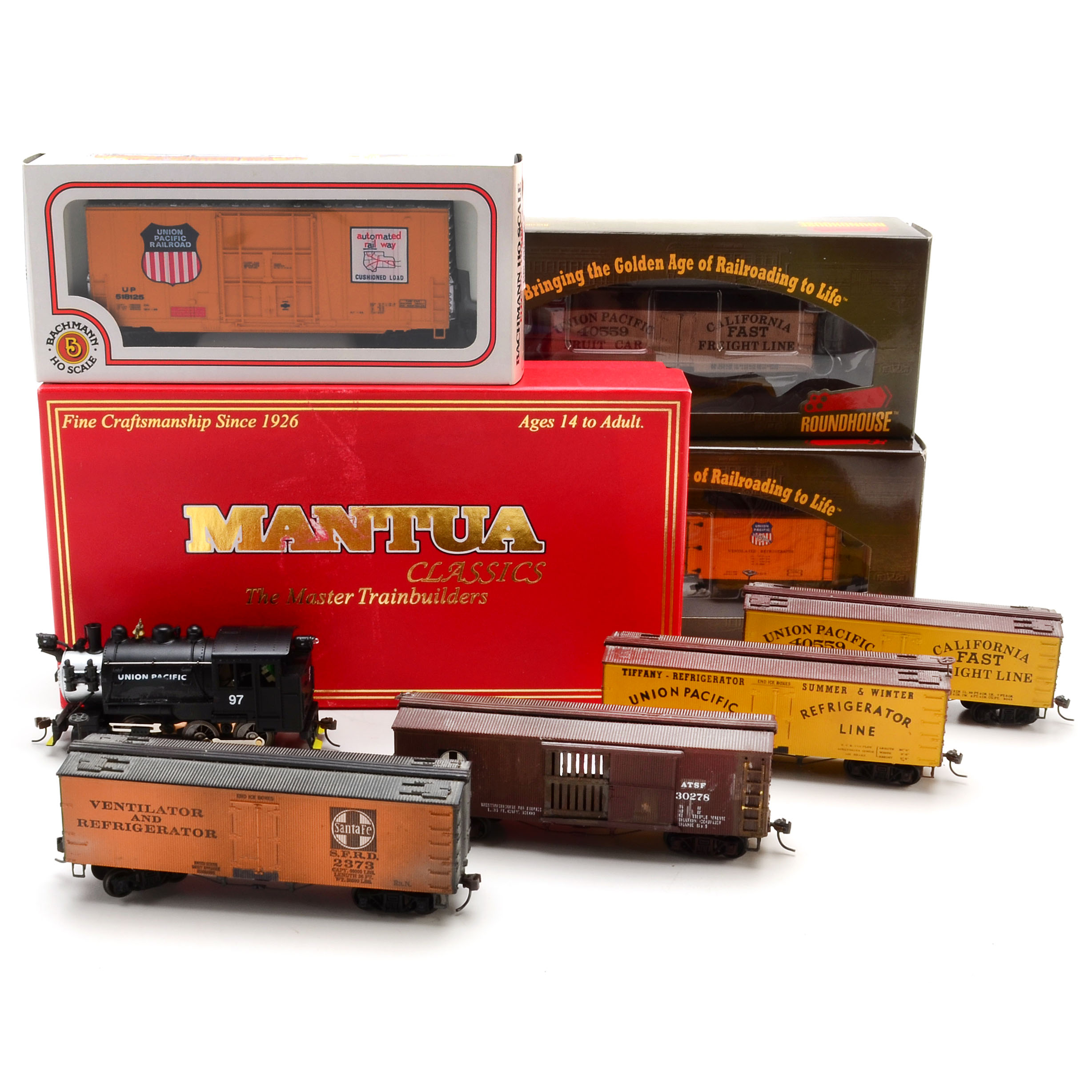 Assortment of HO Scale Train Cars with En