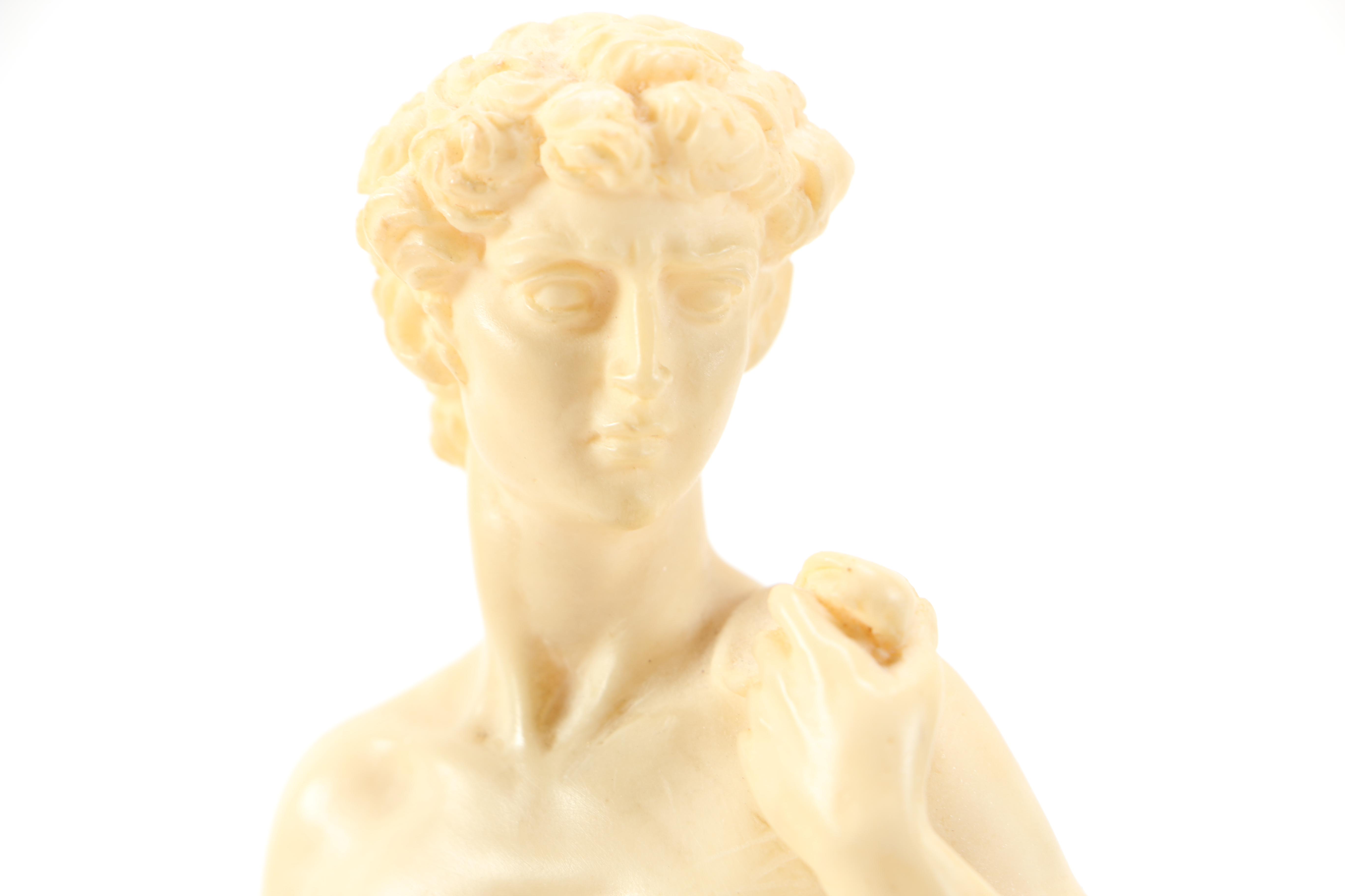 Reproduction of Michelangelo's "David" and Soldier Figurines