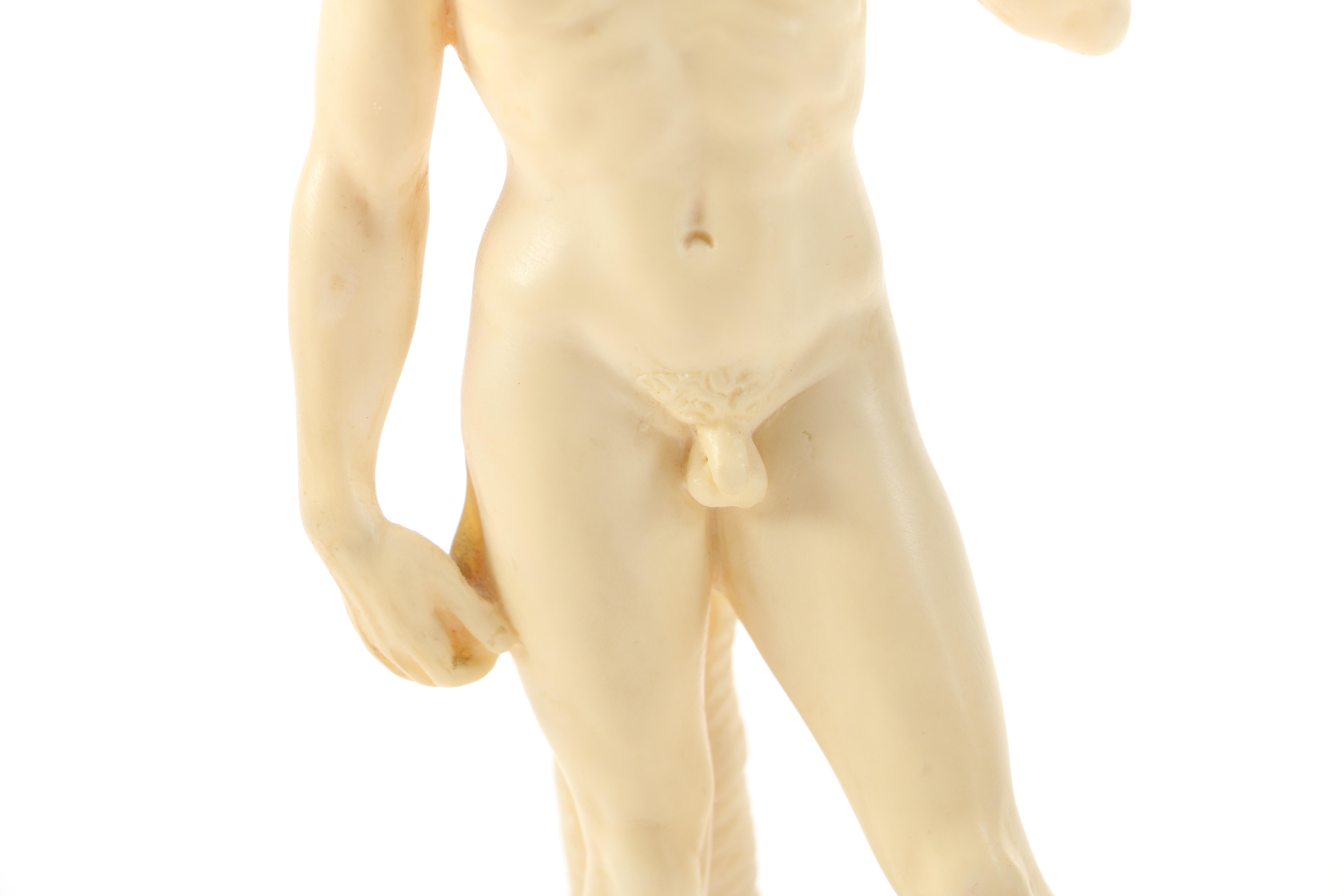 Reproduction of Michelangelo's "David" and Soldier Figurines