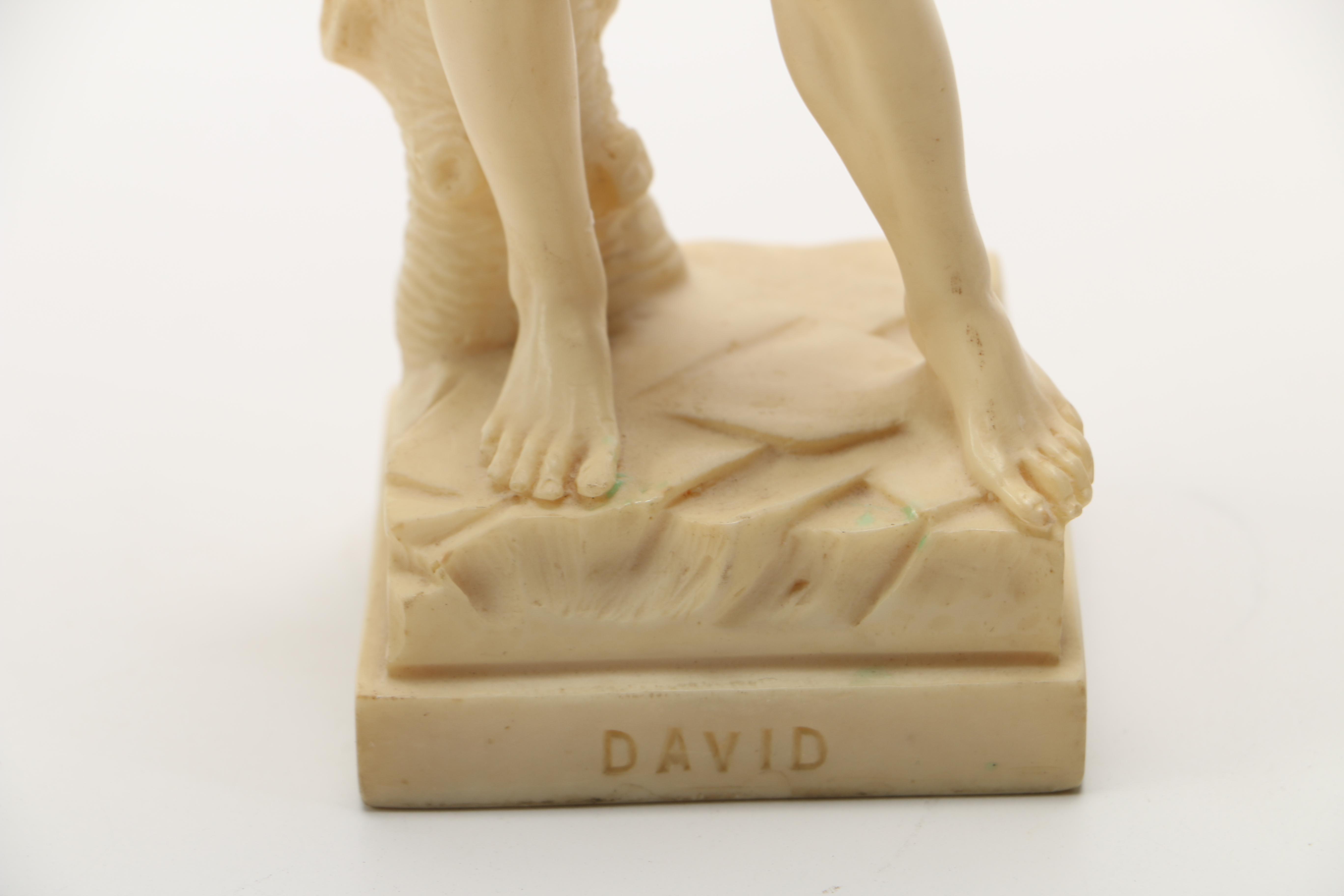 Reproduction of Michelangelo's "David" and Soldier Figurines