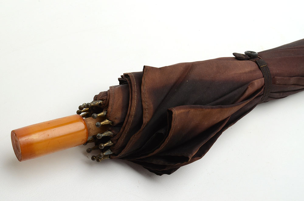 Vintage Umbrella with Pottery Vase and Shoe Stretchers