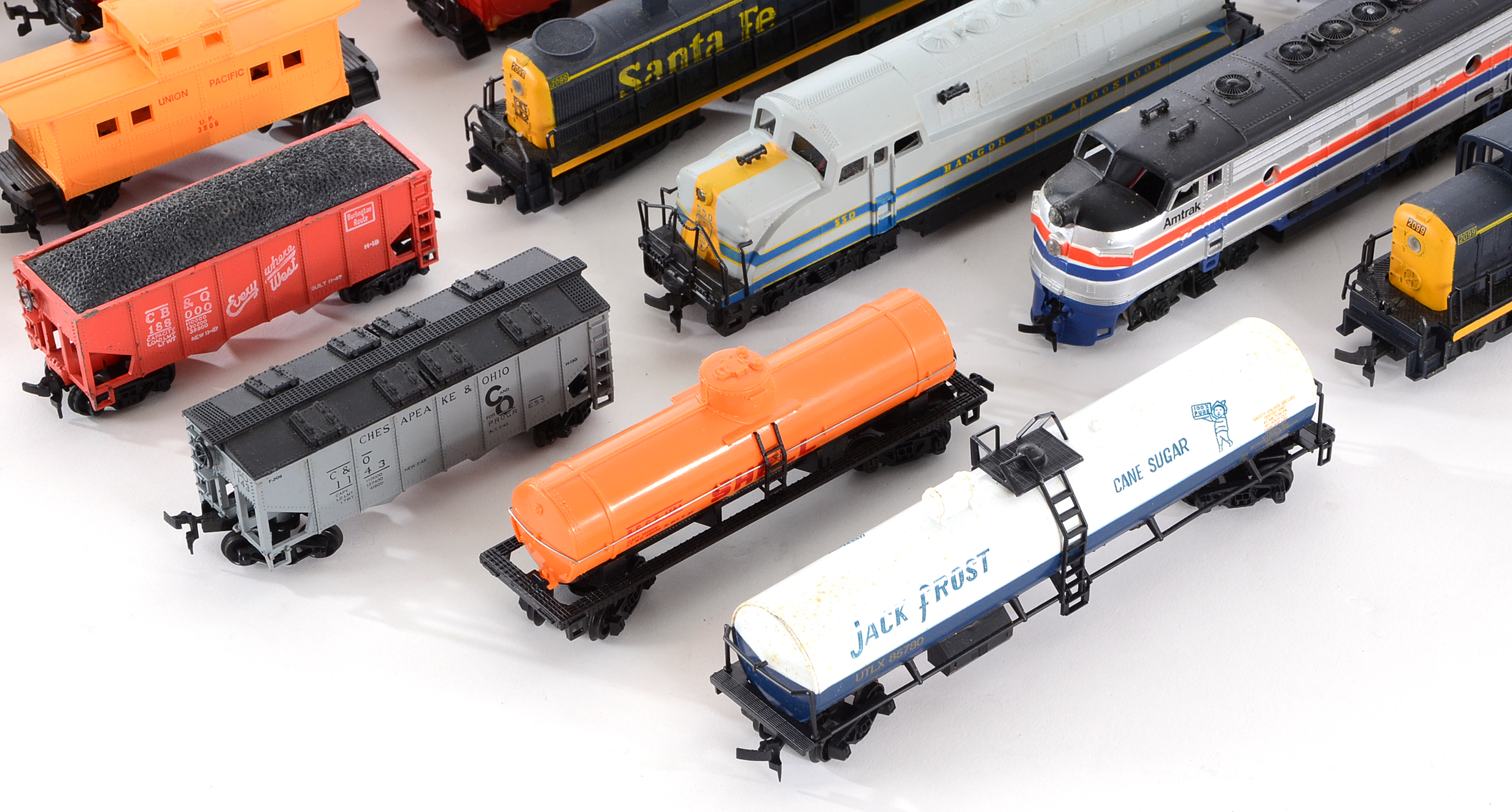 Assortment of HO Scale Diesel Locomotives  and Train Cars
