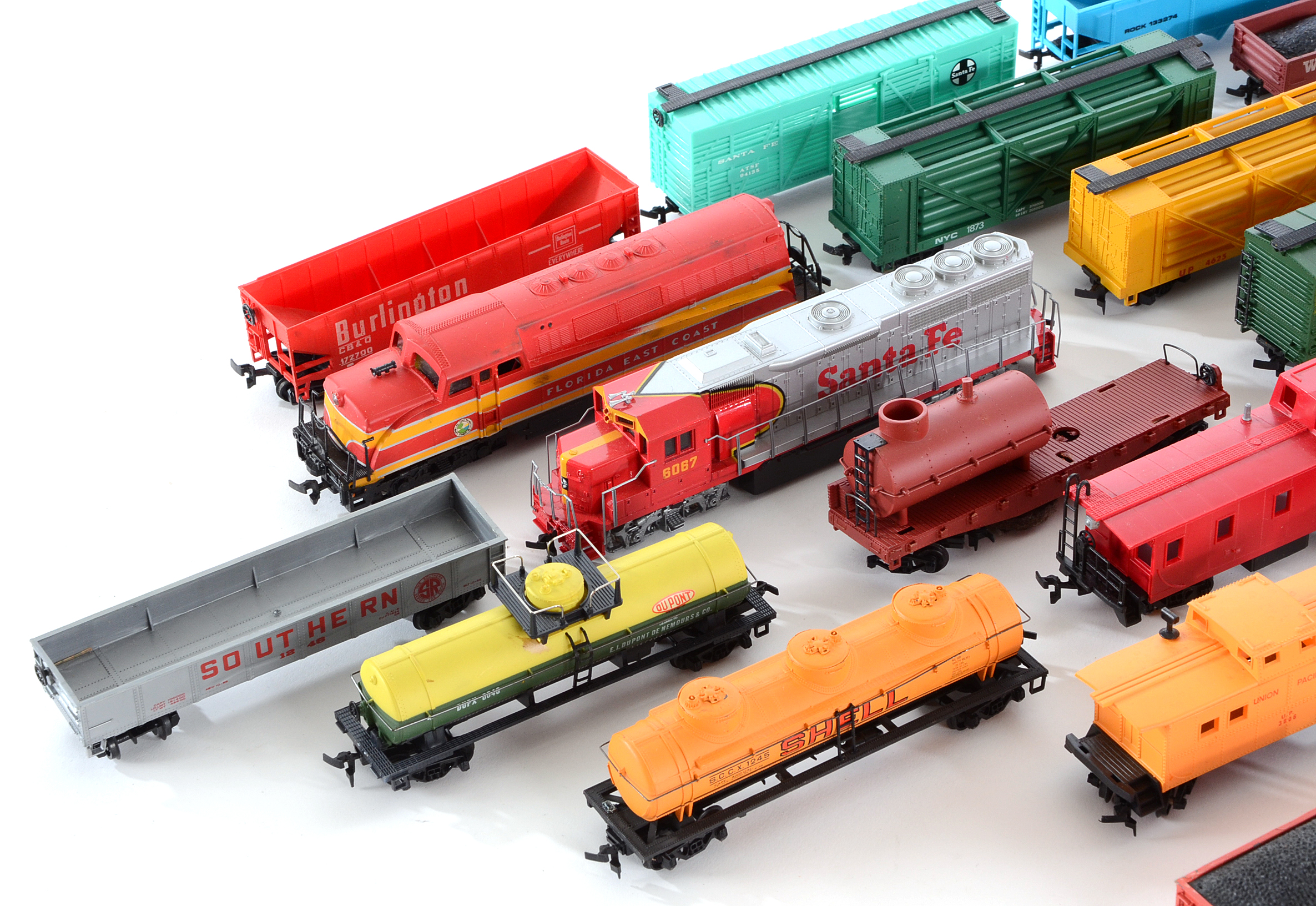 Assortment of HO Scale Diesel Locomotives  and Train Cars