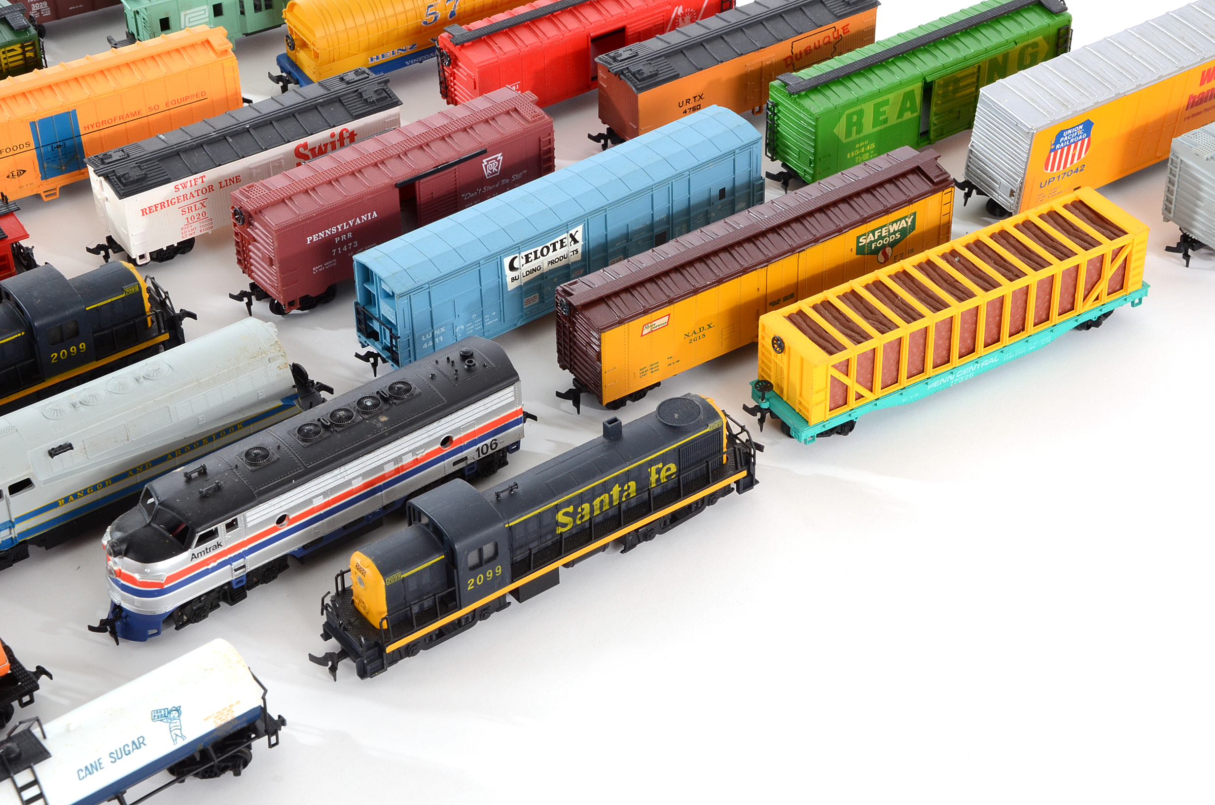 Assortment of HO Scale Diesel Locomotives  and Train Cars