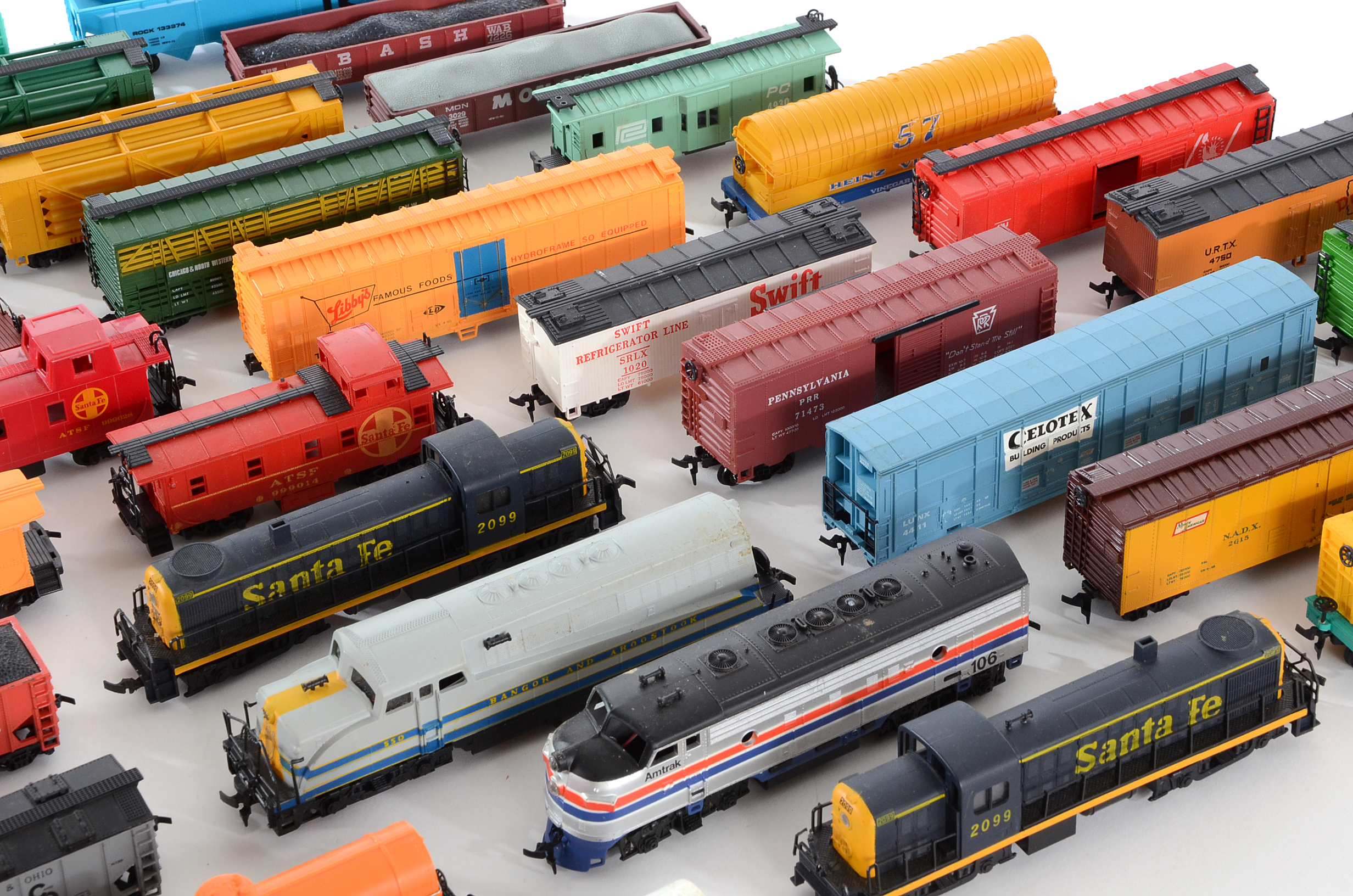 Assortment of HO Scale Diesel Locomotives  and Train Cars