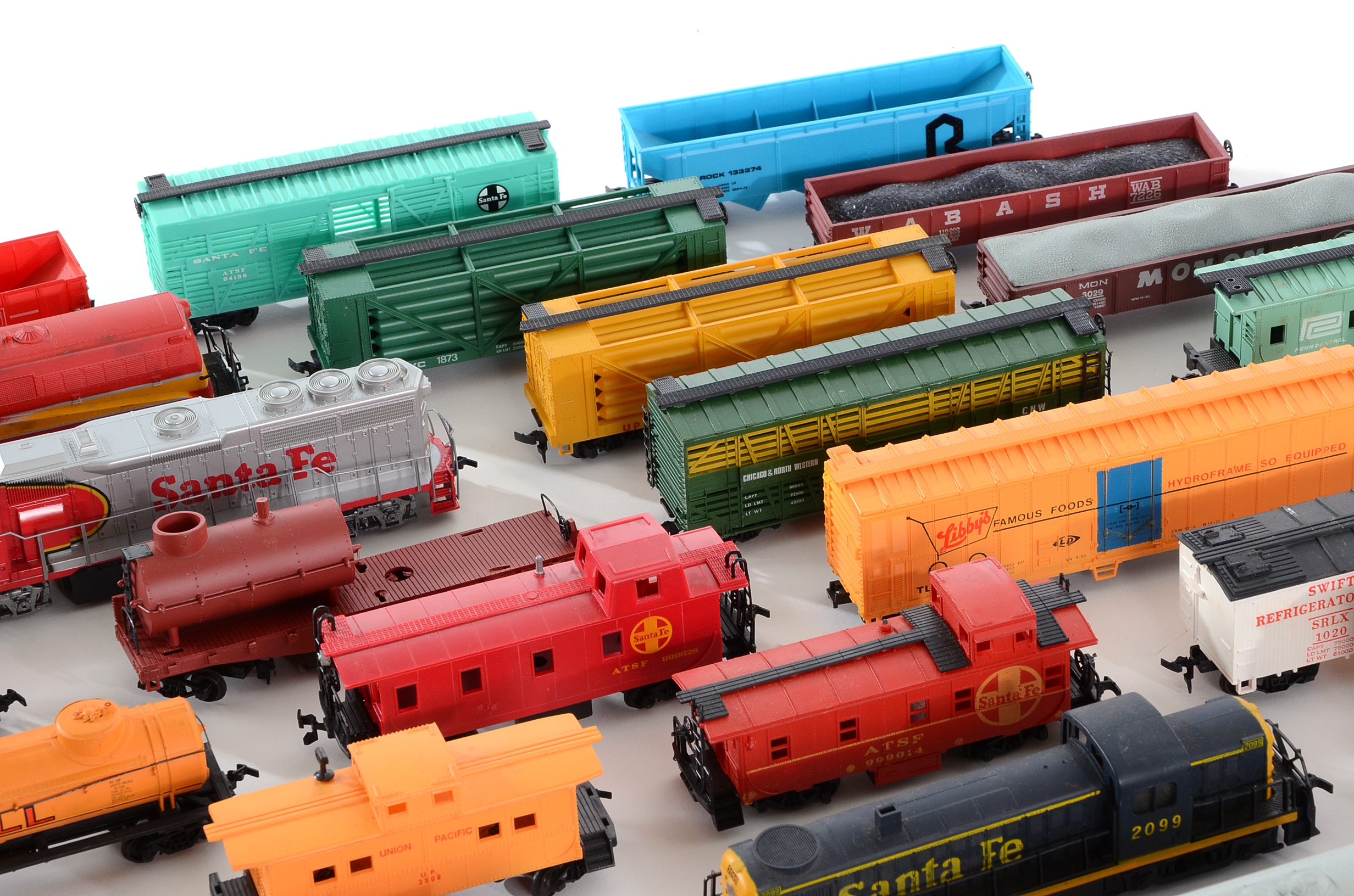Assortment of HO Scale Diesel Locomotives  and Train Cars