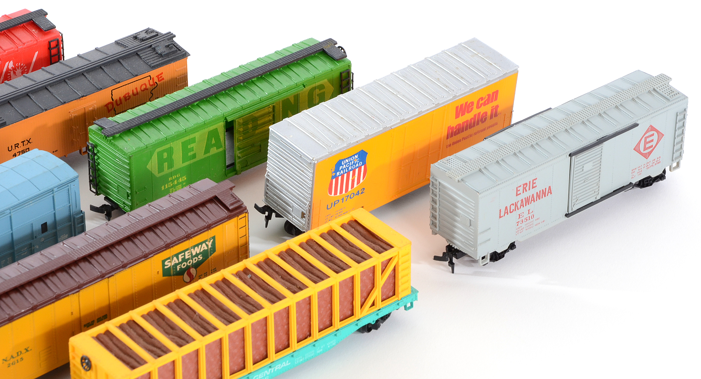 Assortment of HO Scale Diesel Locomotives  and Train Cars