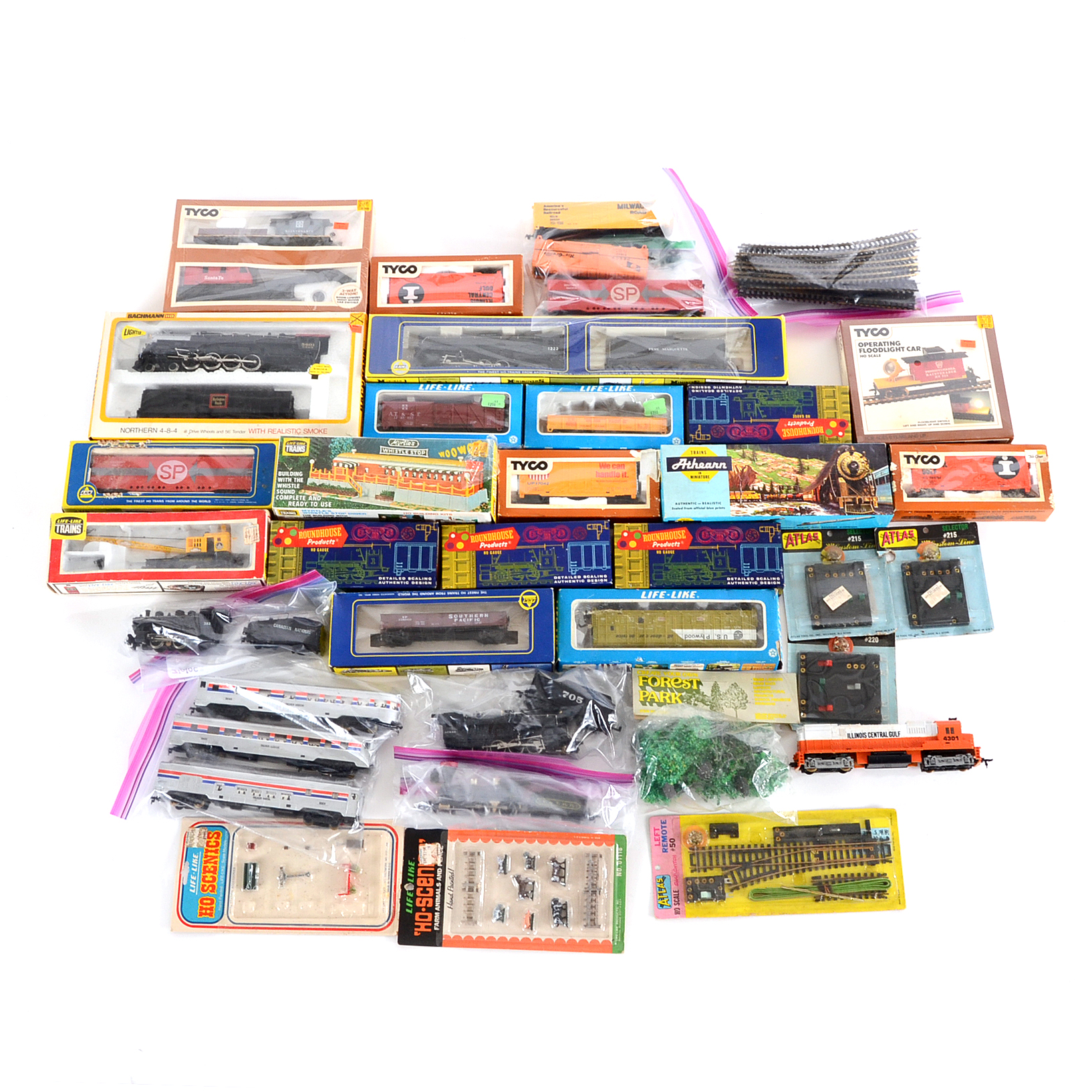 Collection of HO Gauge Locomotives with Train Cars and Accessorie