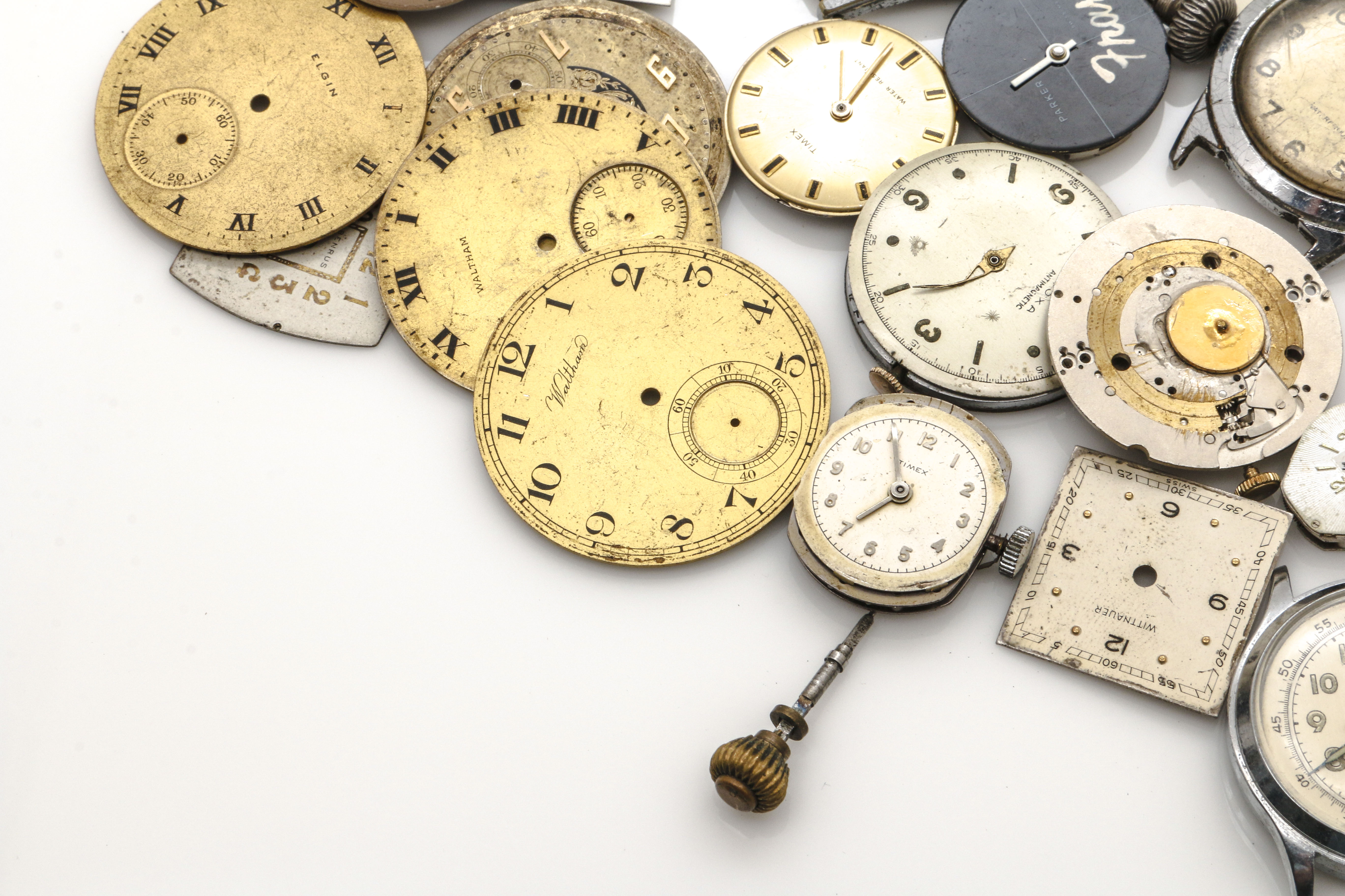 Assortment of Watch Movements, Dials, Cases, and Parts