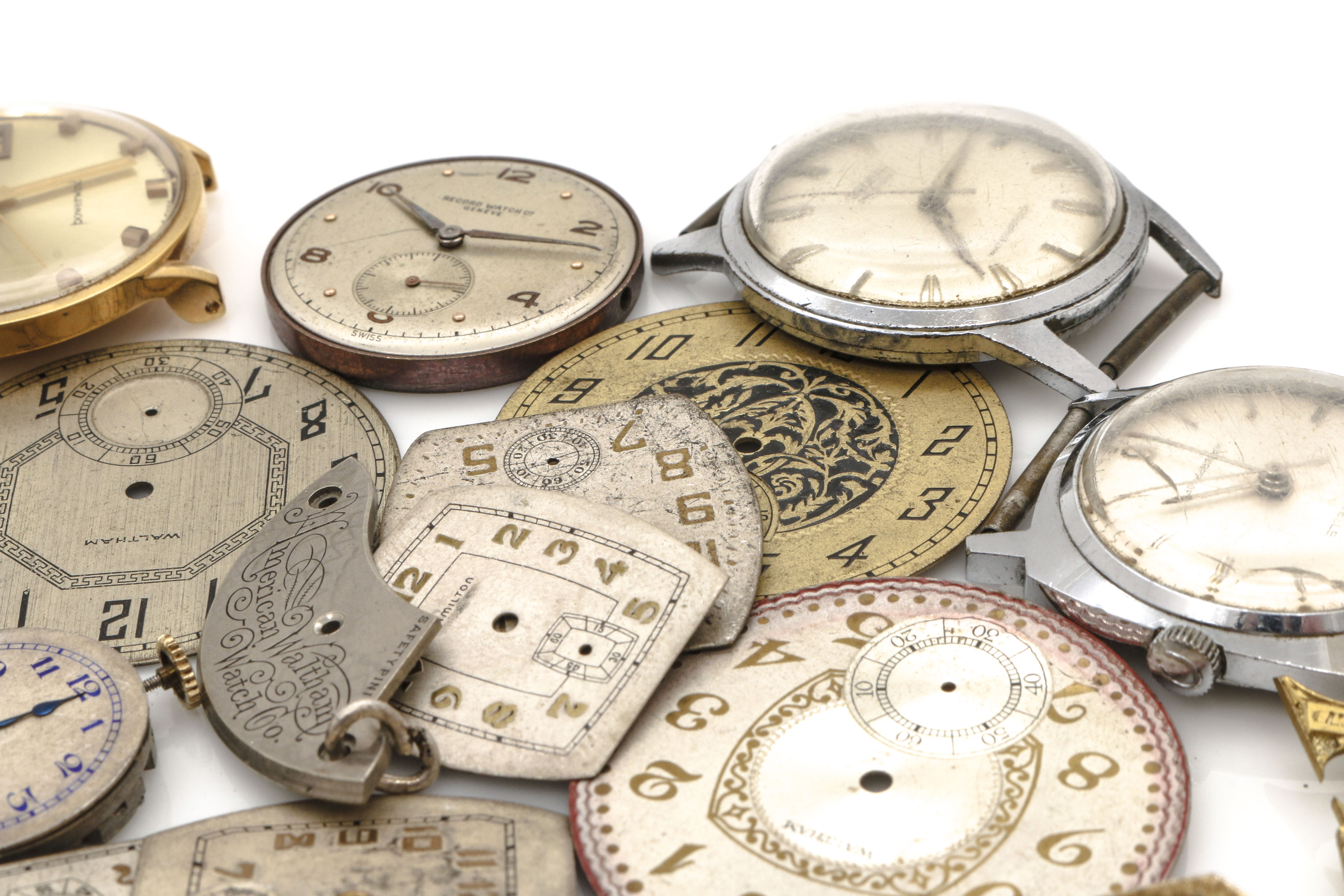 Assortment of Watch Movements, Dials, Cases, and Parts