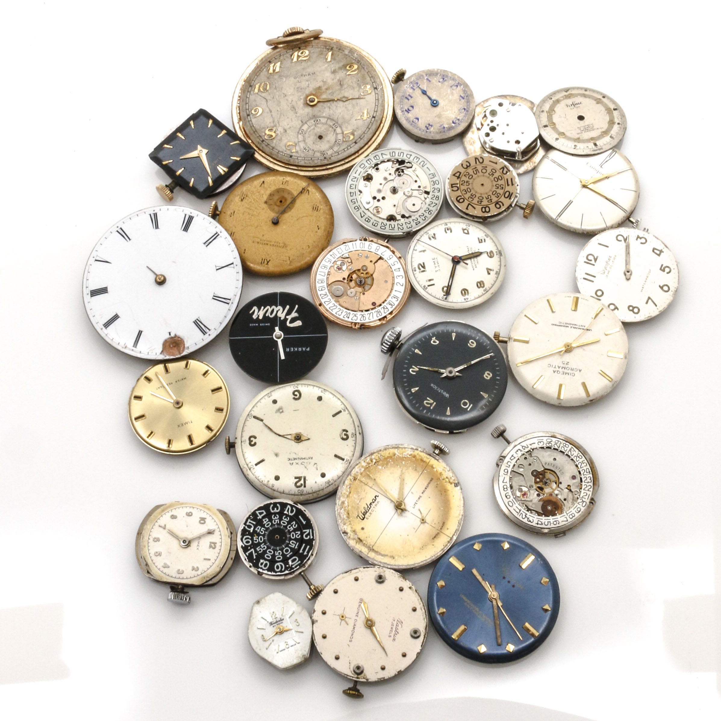 Assortment of Watch Movements, Dials, Cases, and Parts