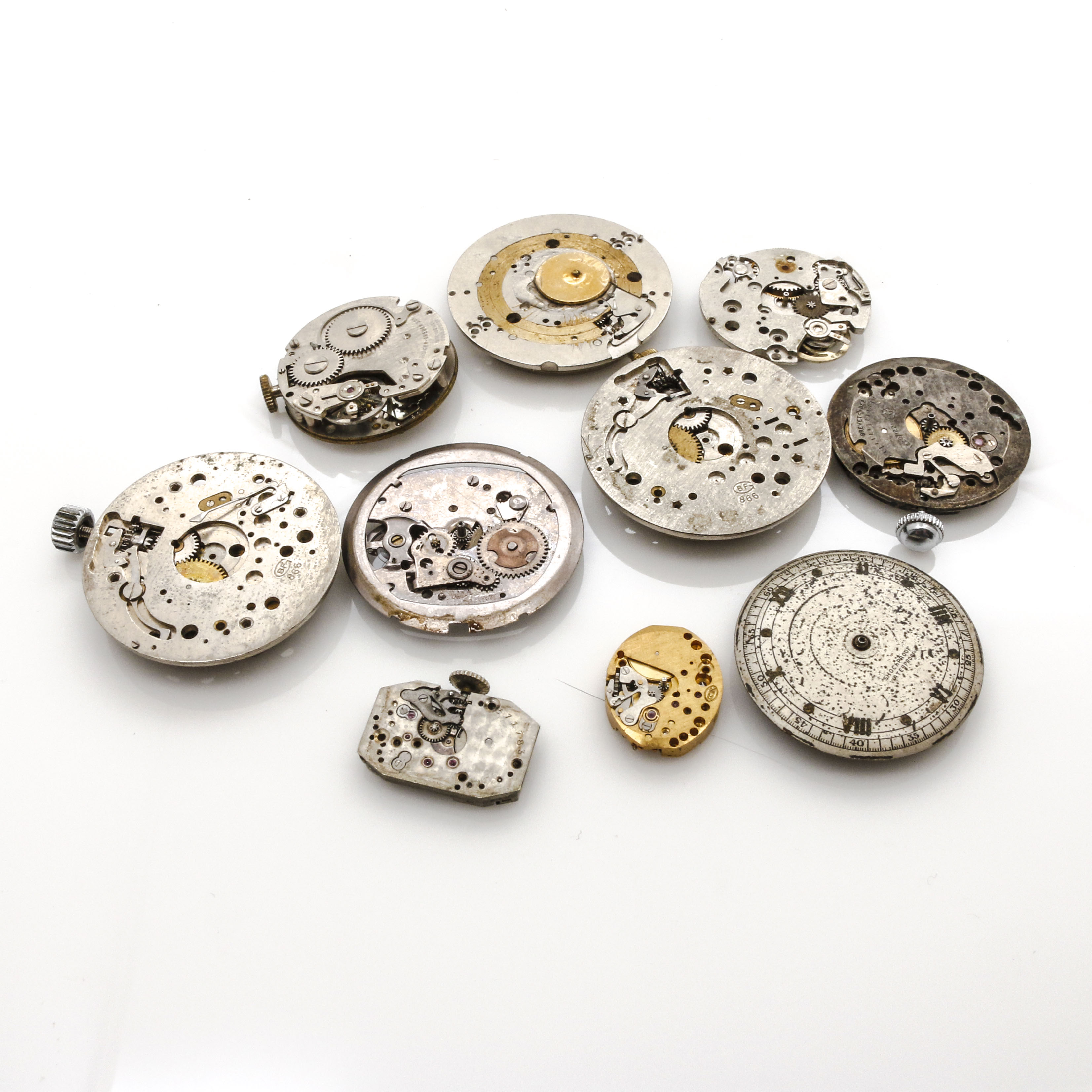 Assortment of Watch Movements, Dials, Cases, and Parts