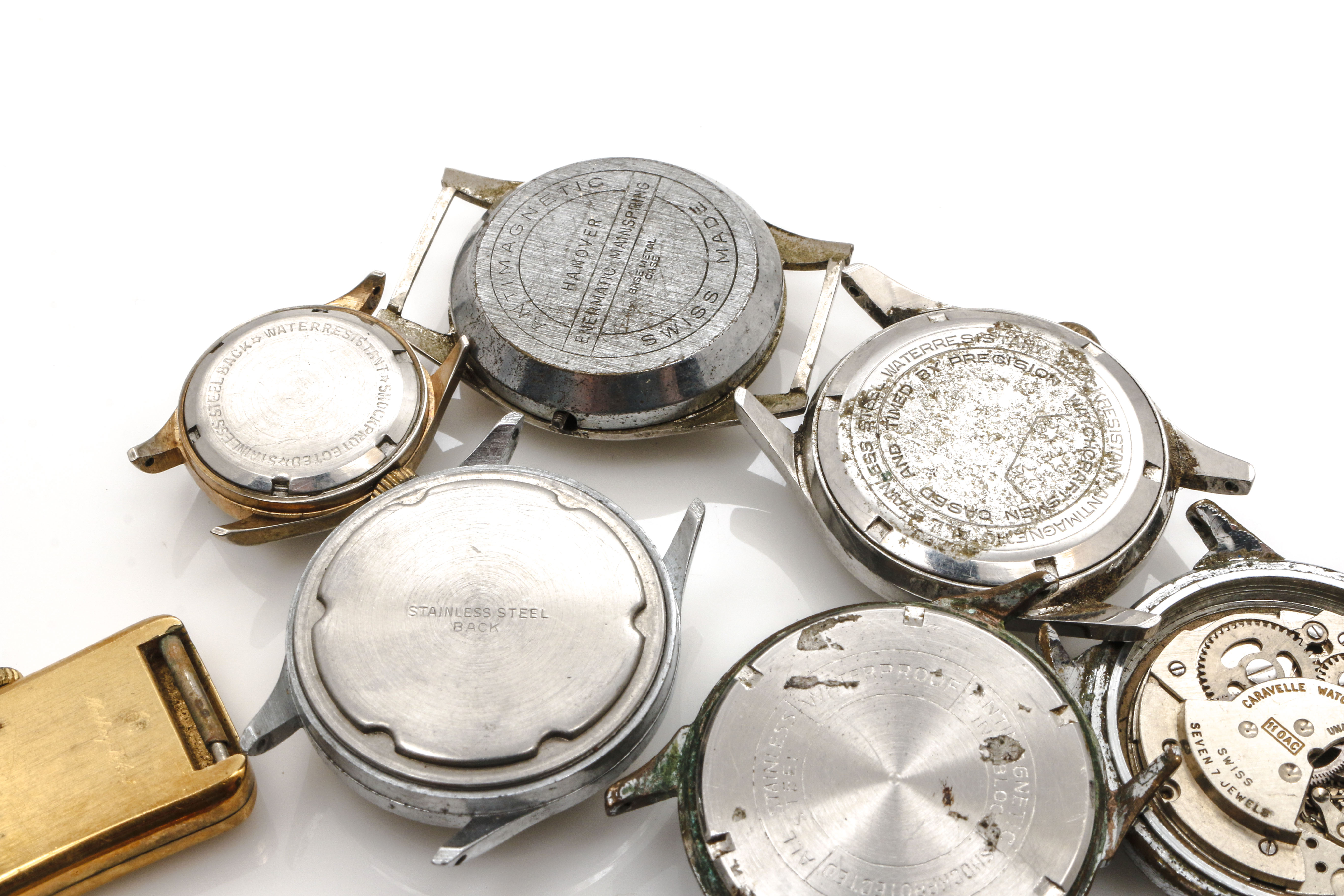 Assortment of Watch Movements, Dials, Cases, and Parts