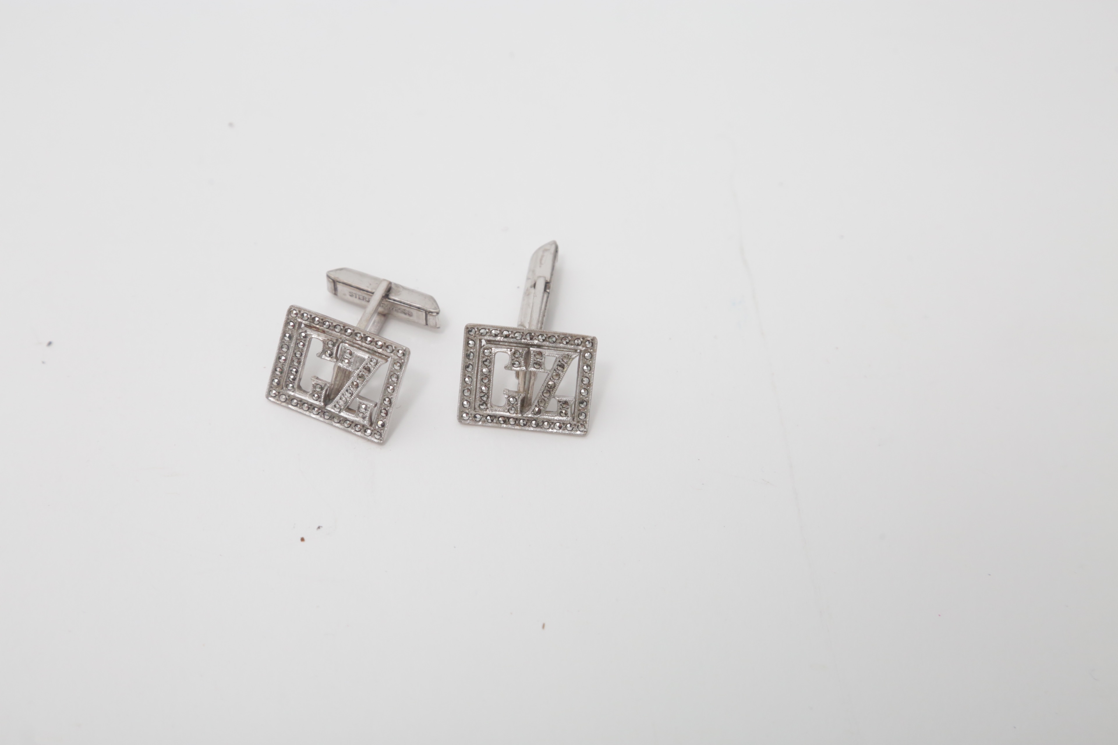 Sterling Silver Jewelry Featuring an Articulated Cat Brooch