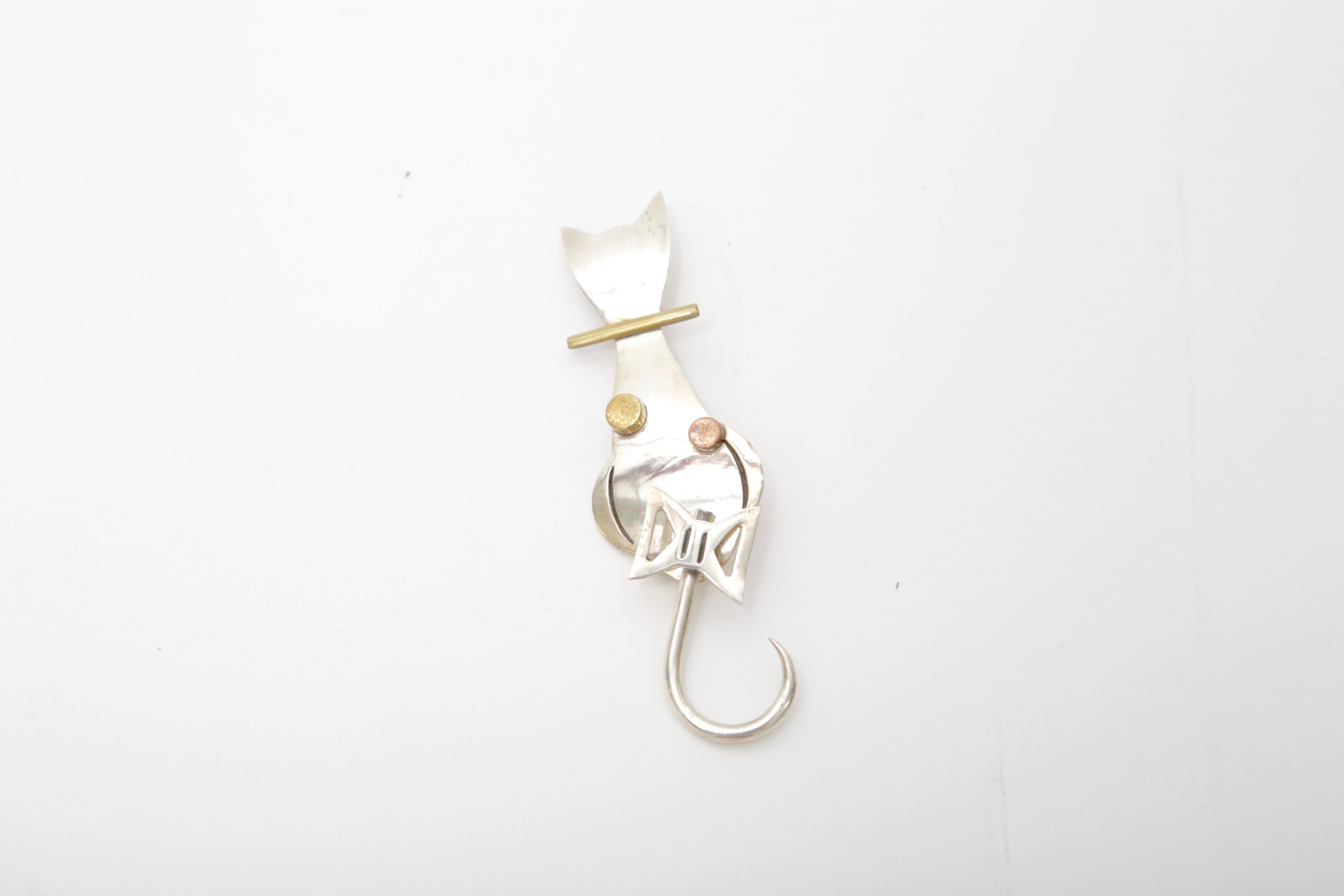 Sterling Silver Jewelry Featuring an Articulated Cat Brooch