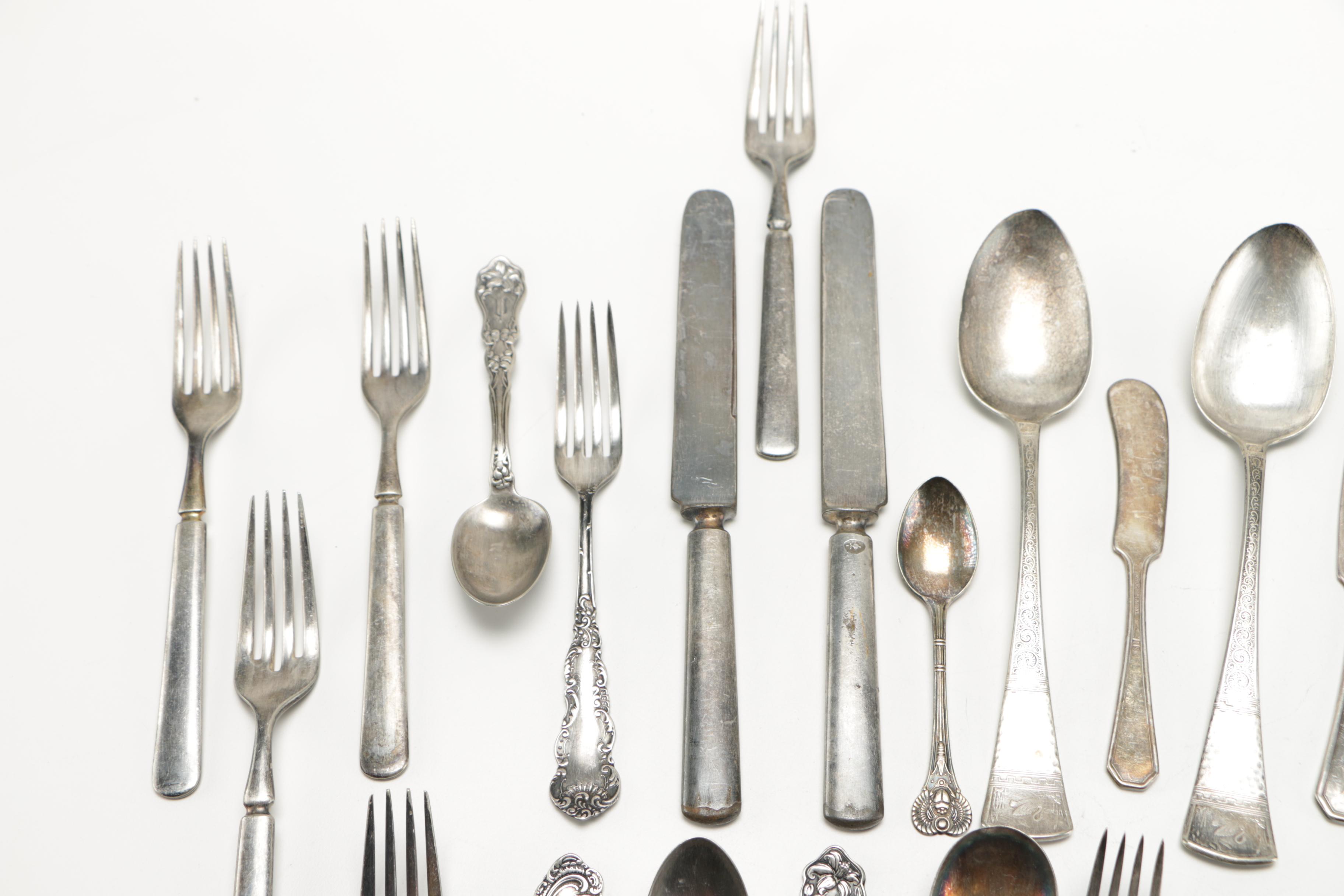 Assorted Silver Plate Flatware Featuring C.D Peacock